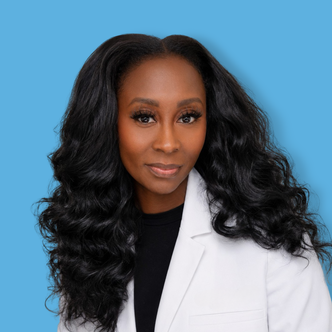 Dr. Jamekia Bailey Preferred Blue Background Headshot