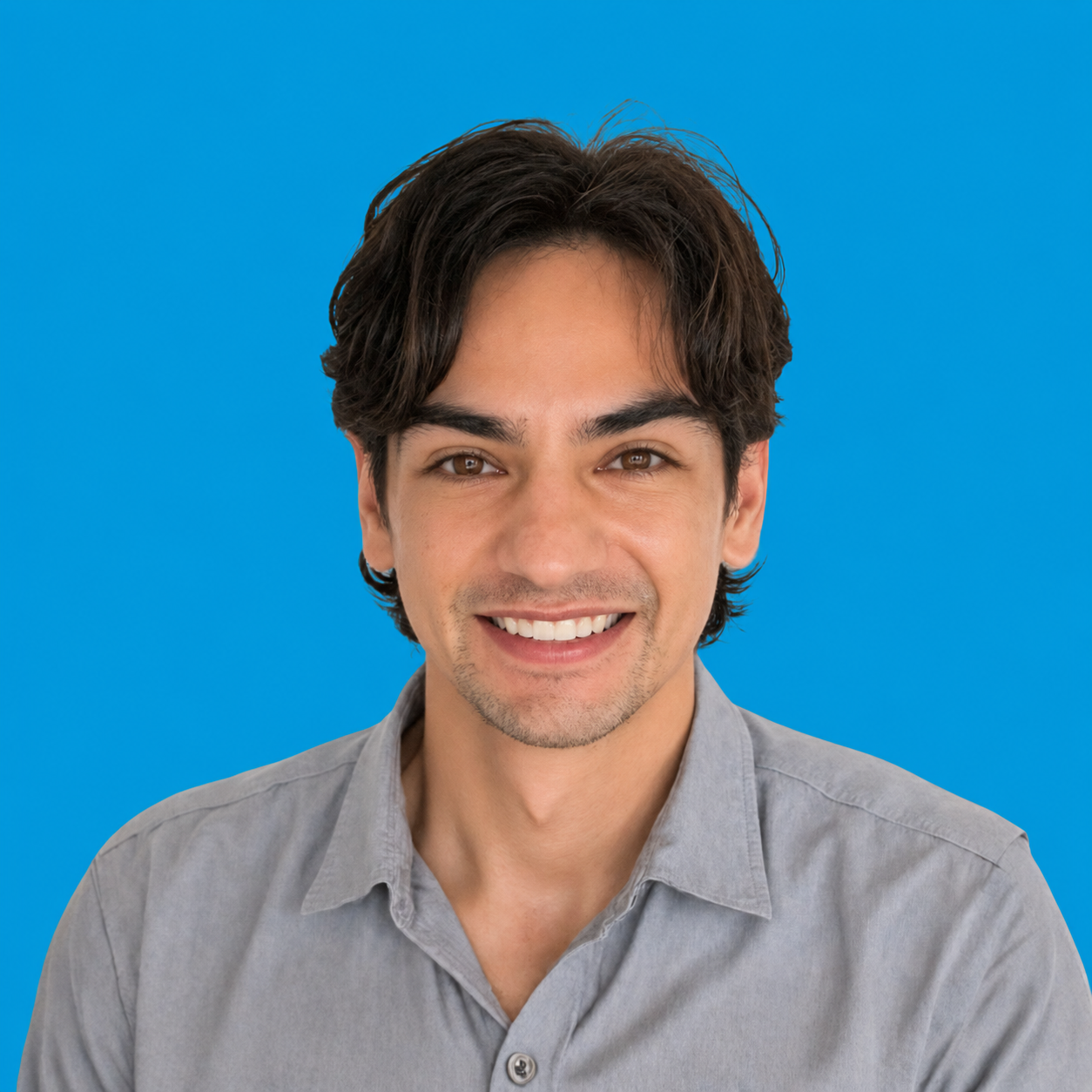 Dr. Nathan Figueroa Headshot_blue background